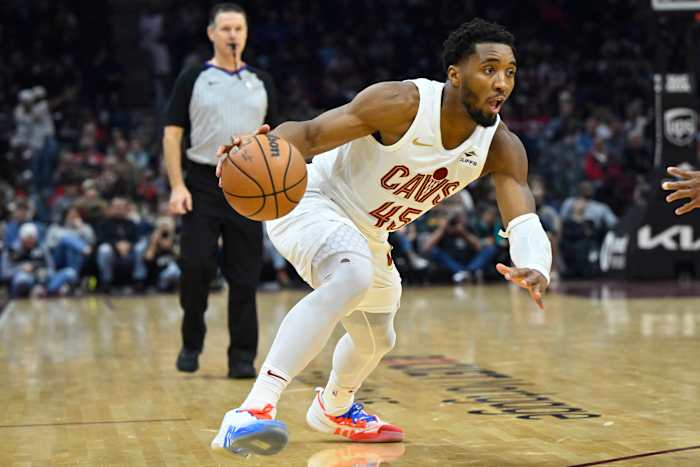 Dec 18, 2023; Cleveland, Ohio, USA; Cleveland Cavaliers guard Donovan Mitchell (45) dribbles in the second quarter against the Houston Rockets at Rocket Mortgage FieldHouse.